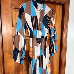 This Spring dress is lightweight, size S, color multi.